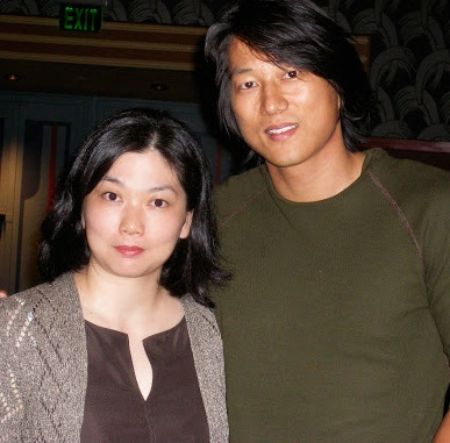 Miki Yim with her husband, Sung Kang