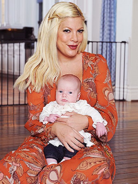 Tori Spelling with her baby