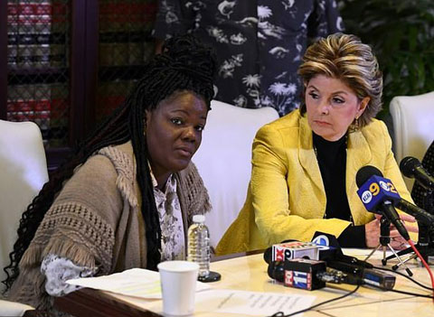 Essie Grundy and the women's right attorney during the press conference on Friday