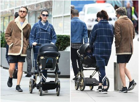 Anne Hathaway with her husband and child