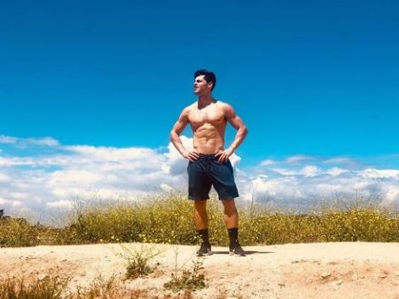 Actor Chris Petrovski showing off his toned body. 