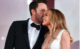 Protective boyfriend Ben Affleck pushes a fan from taking pictures with Girlfriend Jennifer Lopez